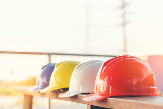 Hard hats lined up in a row